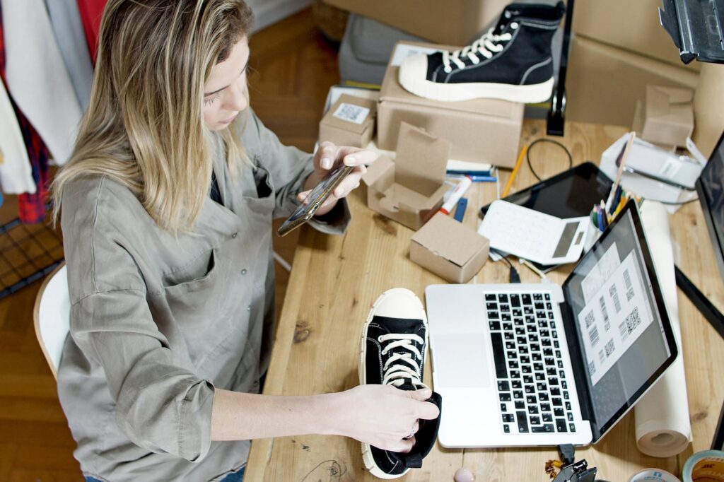 woman taking photo of the product
